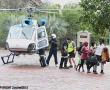  Members of the farm communities who were evacuated from their areas are offloaded from a helicopter at an assembly point at Dongola Ranch. Photo supplied.