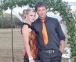 <p>Sheri-Lee Berry, elegant in haar oranje en swart tabberd, en haar metgesel, Marnus Badenhorst, afgeneem met hul aankoms by Ho&euml;rskool Louis Trichardt se jaarlikse matriekafskeid. Sheri-Lee is &lsquo;n Graad 12-leerling by die skool.&nbsp;</p>
