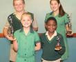 <p>Hierdie leerlinge van Laerskool Louis Trichardt ontvang die top trofe&euml; vir tennis tydens die skool se jaarlikse sport prysuitdeling op 28 Oktober. Voor, van links na regs, is Angelique van der Westhuizen (beste junior tennisspeler: meisie) en Khudani Muedi (beste junior tennisspeler: seun). Agter is LJ Fick (beste senior tennisspeler: seun) en Maggie Kemp (beste senior tennisspeler: meisie).</p>
