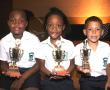 <p>Ridgeway Independent School hosted their junior phase prize-giving ceremony at the school hall of Ridgeway College in Louis Trichardt on 25 November. From left to right are trophy winners Nhlayiseko Hlavangani (fellowship trophy), Paballo Maluleka (diligence trophy) and Luqmaan Hoosen (eco-awareness trophy).</p>
