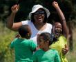 <p>Mrs Mapfumo from the Ridgeway Independent School outside of Louis Trichardt is surounded by members of the winning team, Earth.</p>
