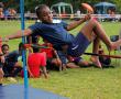 <p>Vhukhuolo Ratshitanga (Grade 5) of the Water Team tries her best in the high jump.</p>
