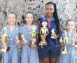 <p>Di&eacute; vier meisies van Laerskool Messina het tydens die skool se jaarlikse prysuitdeling trofe&euml; ontvang vir hul prestasies in kultuur (ATKV en Ek Weet). Van links na regs staan Stephi Roos (ATKV senior, nadat sy deurdring tot die provinsiale semi-finaal van die ATKV en &lsquo;n sesdeplek behaal), Carmen Roos (Ek Weet), Nhlamula Mathebula (Ek Weet) en Serea Pretorius (ATKV junior). <em>Foto verskaf.</em></p>
