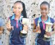 <p>Hierdie Graad 7-leerlinge van Laerskool Mes&shy;sina is met trofe&euml; beloon vir hul akademiese prestasies die afgelope jaar. Hulle het hulle toekennings ontvang, tydens die skool se jaarlikse prysuitdeling op 11 November. Van links na regs is Sarah Mulondo (deurlopende goeie uitslae gedurende 2015), Nhlamulo Mathebula (beste prestasie in Afrikaans eerste addisionele taal), Chantel Buys (beste prestasie in Engels huistaal) en Luan Esterhuizen (beste prestasie in tegnologie en skeppende kunste). <em>Foto&rsquo;s verskaf</em>.</p>
