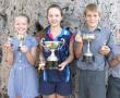 <p>Hierdie leerlinge van Laerskool Messina is aangewys as die skool se beste swemmers van 2015 tydens die skool se jaarlikse prysuitdeling. Van links na regs is Jan&eacute;l Pieterse (beste junior meisie), Jon&eacute; Geyer (beste senior meisie), Arno Roets (beste senior seun) en Marco van der Merwe (beste junior seun). <em>Foto verskaf.</em></p>

